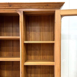 A 19th Century English Pine Bookcase Cabinet or Hutch with Arched Doors