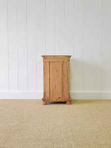A Vintage Charming Pine Nightstand with Dark Knobs