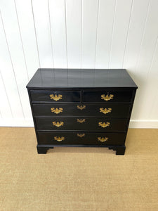 An Ebonized Antique English Chest of Drawers/Dresser