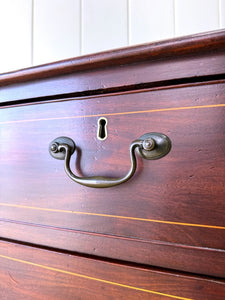 A English Georgian Mahogany Chest of Drawers with Swan Neck Hardware