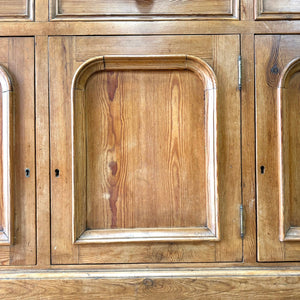 A 19th Century English Pine Bookcase Cabinet or Hutch with Arched Doors