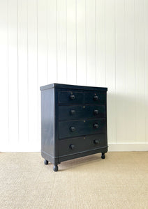 An Ebonized Antique English Chest of Drawers/Dresser