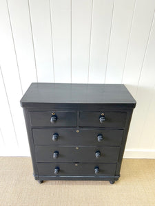 An Ebonized Antique English Chest of Drawers/Dresser