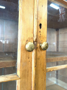 An English 19th Century Pine Bookcase with Glazed Doors