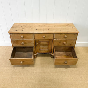 An English Country 7 Drawer Pine Buffet or Sideboard