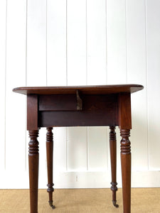 A Petite Early Victorian Mahogany Pembroke Table