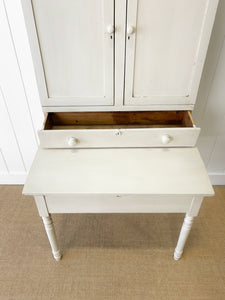 A 19th Century Clerk's Desk with Slant Front and Cabinet
