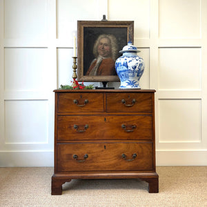 A English Georgian Chest of Drawers with Swan Neck Hardware