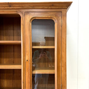 A 19th Century English Pine Bookcase Cabinet or Hutch with Arched Doors