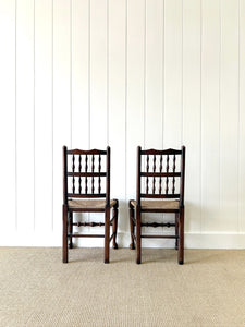A Vintage Set of 6 English Oak Spindle Back Chairs with Rush Seats