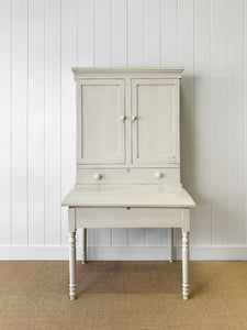 A 19th Century Clerk's Desk with Slant Front and Cabinet