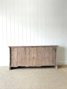 An Antique English Oak Sideboard