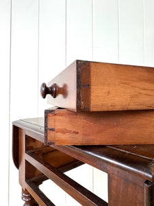 A Petite Early Victorian Mahogany Pembroke Table