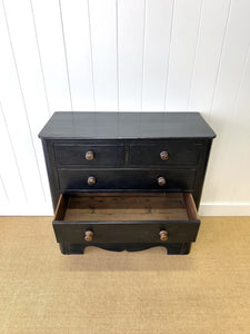 An Ebonized Antique English Chest of Drawers/Dresser