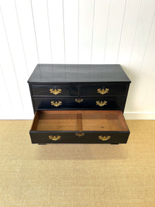 An Ebonized Antique English Chest of Drawers/Dresser