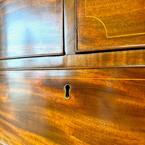 A Large Antique English Bow Front Mahogany Chest of Drawers