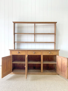 An Early 19th Century Monumental Pine Welsh Dresser or Cupboard