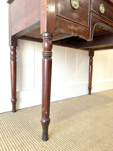 An Antique English Desk or Table with Three Drawers