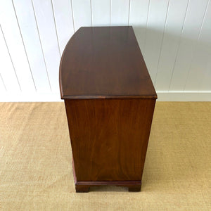 A Large Antique English Bow Front Mahogany Chest of Drawers