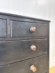 An Ebonized Antique English Chest of Drawers/Dresser