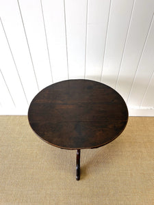A George III Oak Circular Tilt-Top Tripod Tea Table