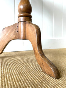 An Antique English Birch Tilt-top Table