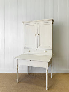 A 19th Century Clerk's Desk with Slant Front and Cabinet