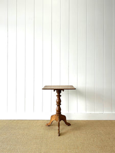 An Antique English Birch Tilt-top Table