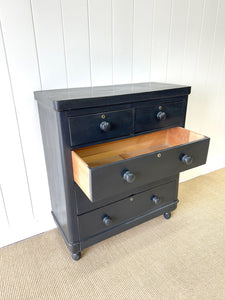 An Ebonized Antique English Chest of Drawers/Dresser