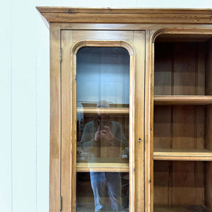 A 19th Century English Pine Bookcase Cabinet or Hutch with Arched Doors