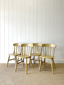 A Vintage Set of 4 Mustard Slat Back Chairs