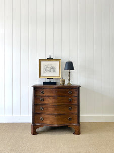 A Unique Serpentine Front Antique Mahogany Chest of Drawers