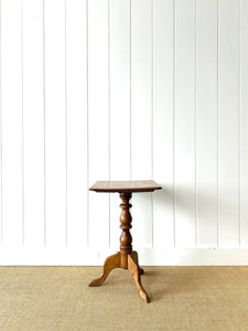 An Antique English Birch Tilt-top Table