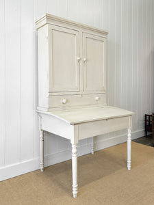 A 19th Century Clerk's Desk with Slant Front and Cabinet