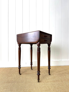 A Petite Early Victorian Mahogany Pembroke Table
