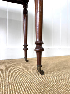A Petite Early Victorian Mahogany Pembroke Table