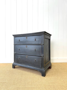 An Ebonized Antique English Chest of Drawers/Dresser