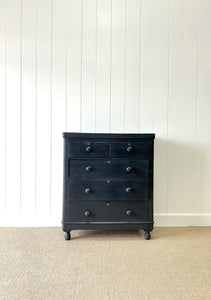 An Ebonized Antique English Chest of Drawers/Dresser