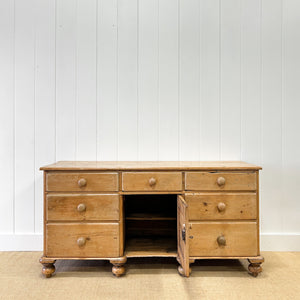 An English Country 7 Drawer Pine Buffet or Sideboard