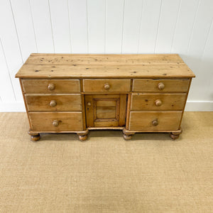 An English Country 7 Drawer Pine Buffet or Sideboard
