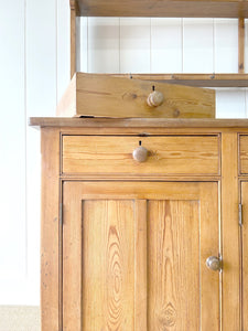 An Early 19th Century Monumental Pine Welsh Dresser or Cupboard