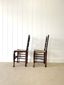 A Vintage Set of 6 English Oak Spindle Back Chairs with Rush Seats
