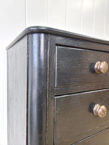 An Ebonized Antique English Chest of Drawers/Dresser