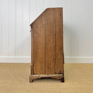 An Antique English Georgian Cumbrian Washed Oak Slant Front Desk