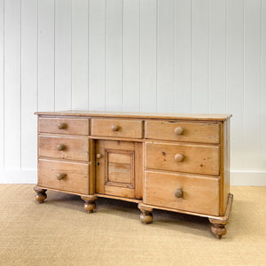 An English Country 7 Drawer Pine Buffet or Sideboard