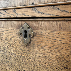 An Antique English Georgian Cumbrian Washed Oak Slant Front Desk