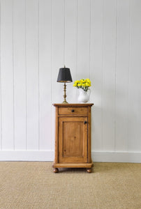 A Vintage Charming Pine Nightstand with Dark Knobs