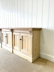 An Antique English Oak Sideboard