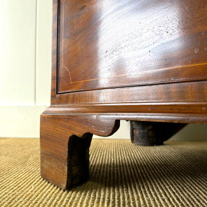 A Large Antique English Bow Front Mahogany Chest of Drawers