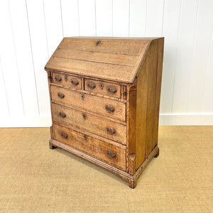 An Antique English Georgian Cumbrian Washed Oak Slant Front Desk